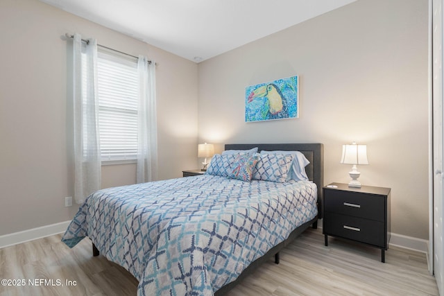 7 Los Lagos Blvd, Palm Coast, FL 32137 - bedroom featuring light wood-type flooring and baseboards