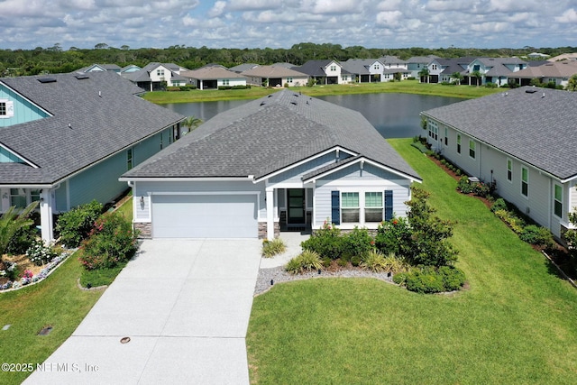 7 Los Lagos Blvd, Palm Coast, FL 32137 - view of front of house with a residential view, a garage, driveway, and a water view