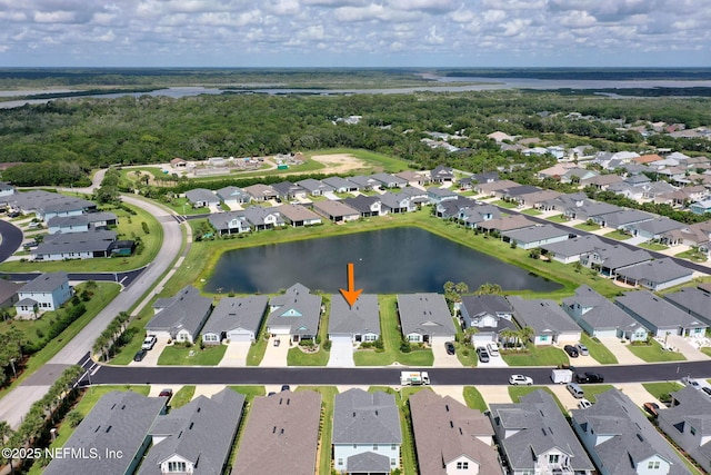 7 Los Lagos Blvd, Palm Coast, FL 32137 - aerial view of property and surrounding area featuring nearby suburban area and a nearby body of water