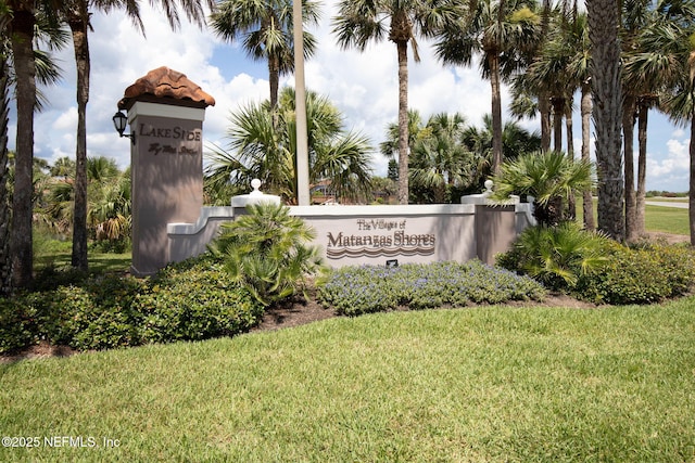 7 Los Lagos Blvd, Palm Coast, FL 32137 - community / neighborhood sign featuring a yard