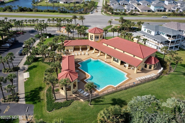 7 Los Lagos Blvd, Palm Coast, FL 32137 - aerial perspective of suburban area with a pool and a nearby body of water