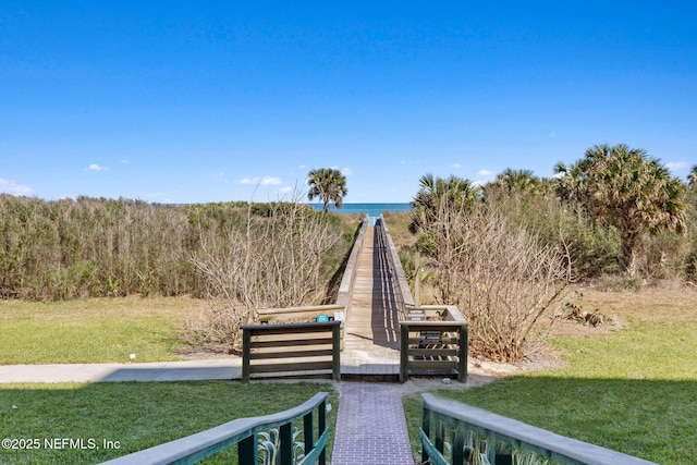 7 Los Lagos Blvd, Palm Coast, FL 32137 - view of home's community with a lawn and a water view