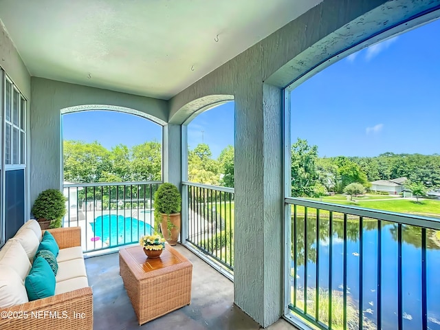 3591 Kernan Blvd S Unit 127, Jacksonville, FL 32224 - balcony featuring view of pool, outdoor lounge area, and a water view