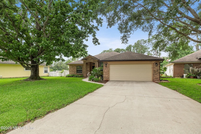 12581 Ashglen Dr N, Jacksonville, FL 32224 - ranch-style home with driveway, an attached garage, and brick siding