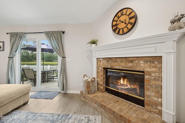 12581 Ashglen Dr N, Jacksonville, FL 32224 - living room with wood finished floors and a fireplace
