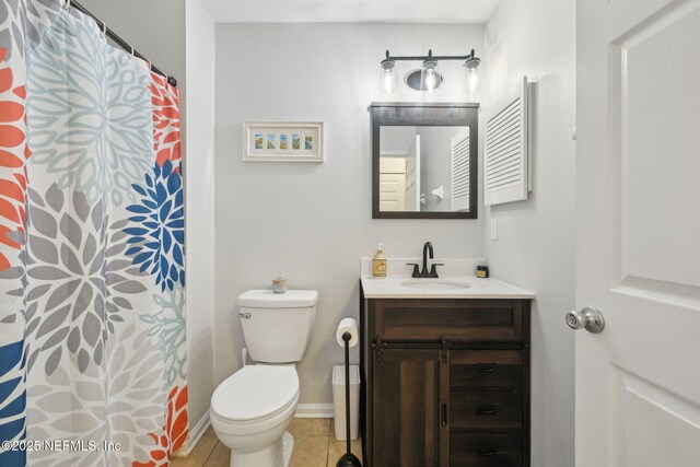 12581 Ashglen Dr N, Jacksonville, FL 32224 - bathroom with vanity, tile patterned floors, and a shower with curtain