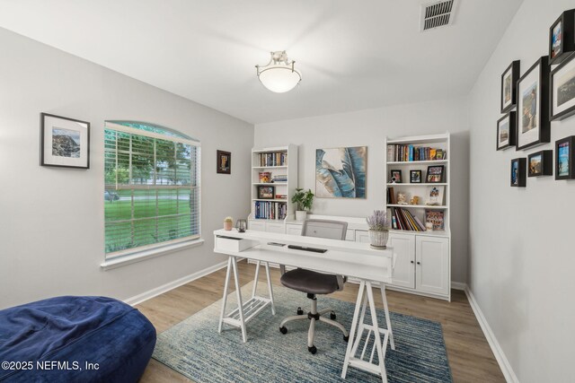 12581 Ashglen Dr N, Jacksonville, FL 32224 - office with wood finished floors and baseboards