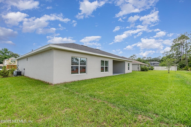 5 Squadron Pl, Palm Coast, FL 32164 - rear view of property with stucco siding
