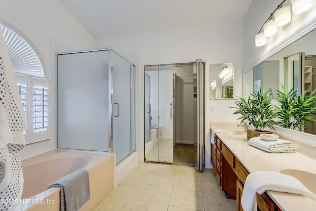1803 Oakbreeze Ct, Jacksonville Beach, FL 32250 - full bathroom featuring a stall shower, double vanity, a bath, and tile patterned floors