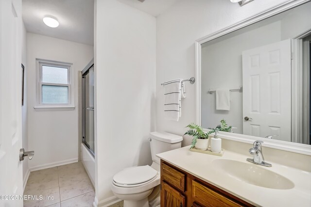 1803 Oakbreeze Ct, Jacksonville Beach, FL 32250 - full bathroom with vanity, enclosed tub / shower combo, and tile patterned flooring