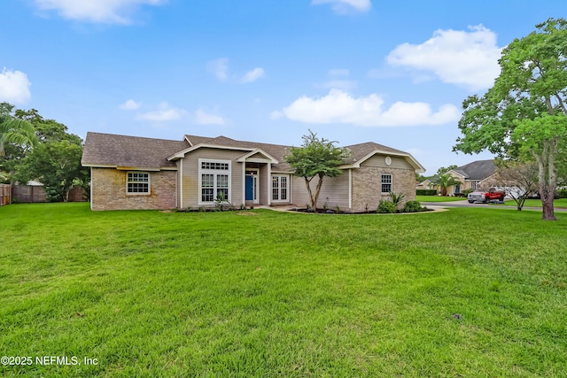1803 Oakbreeze Ct, Jacksonville Beach, FL 32250 - ranch-style home featuring a shingled roof and brick siding