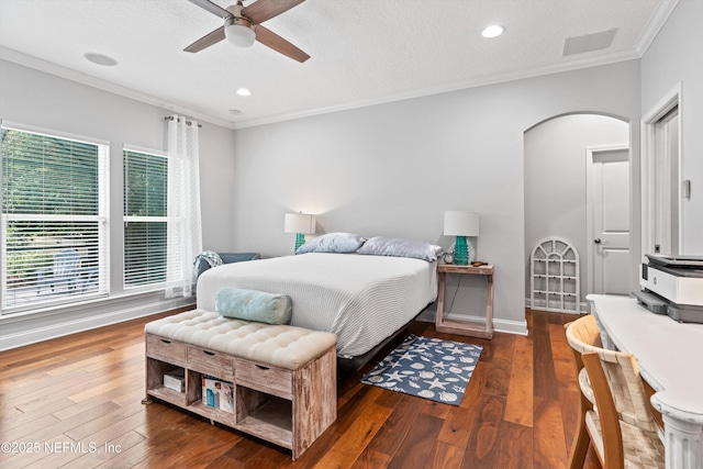 201 History Pl, Saint Augustine, FL 32095 - bedroom featuring crown molding, arched walkways, multiple windows, wood finished floors, and recessed lighting