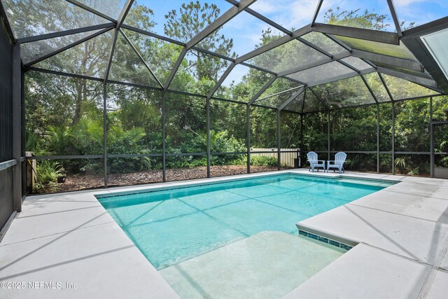201 History Pl, Saint Augustine, FL 32095 - outdoor pool with a patio area and glass enclosure