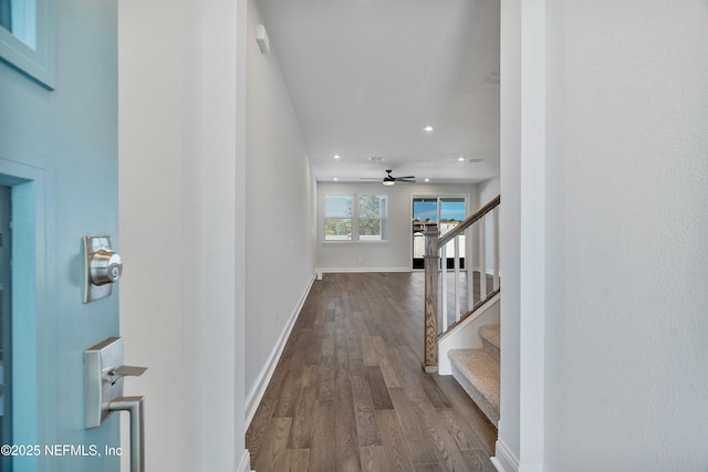 3491 Marsh Reserve Blvd, Jacksonville, FL 32224 - hall featuring dark wood-type flooring, stairway, and recessed lighting
