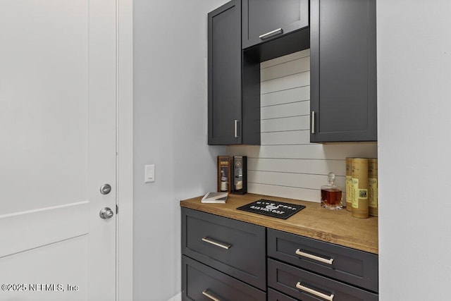 791 Paradise Ln, Atlantic Beach, FL 32233 - kitchen with light countertops and gray cabinets