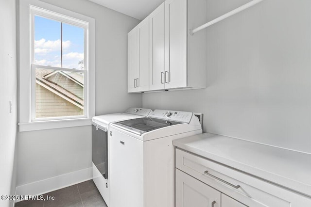 791 Paradise Ln, Atlantic Beach, FL 32233 - washroom with cabinet space, washing machine and clothes dryer, and tile patterned floors