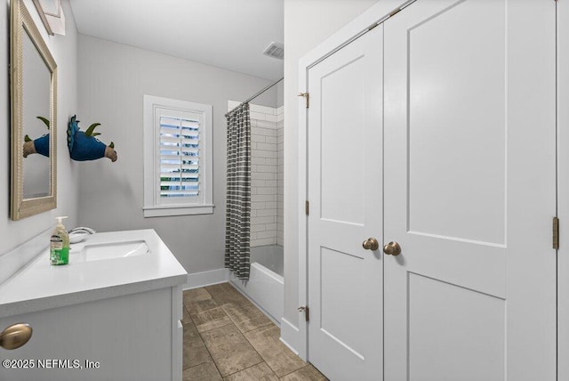 791 Paradise Ln, Atlantic Beach, FL 32233 - bathroom featuring vanity and shower / bath combination with curtain