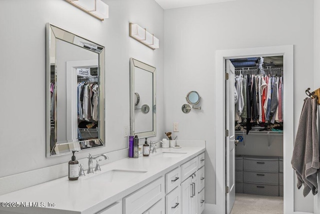 791 Paradise Ln, Atlantic Beach, FL 32233 - bathroom with double vanity and a spacious closet