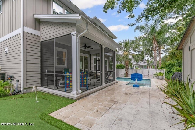 791 Paradise Ln, Atlantic Beach, FL 32233 - view of patio with a putting area, a sunroom, and a ceiling fan
