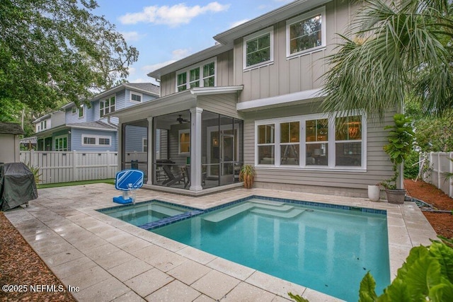 791 Paradise Ln, Atlantic Beach, FL 32233 - view of pool with a ceiling fan, a sunroom, a patio area, a fenced backyard, and area for grilling