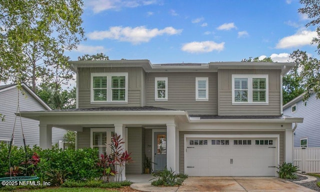 791 Paradise Ln, Atlantic Beach, FL 32233 - view of front facade with covered porch, a garage, and concrete driveway