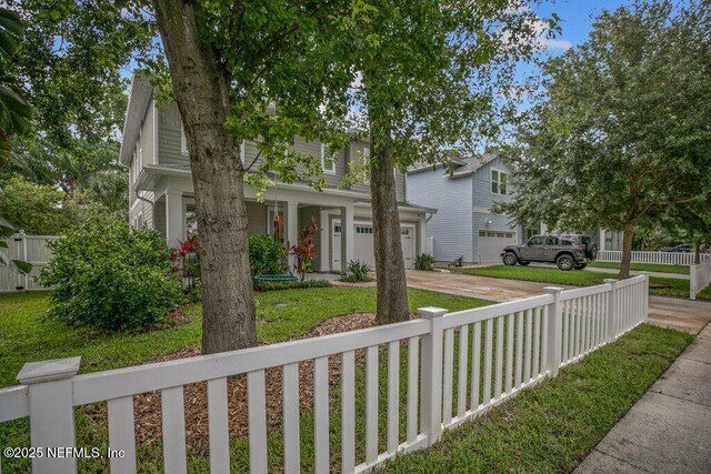 791 Paradise Ln, Atlantic Beach, FL 32233 - view of property hidden behind natural elements with concrete driveway and a porch