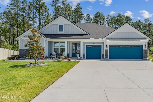 207 Hertford Bridge Way, Saint Johns, FL 32259 - modern farmhouse with board and batten siding, an attached garage, stone siding, and concrete driveway