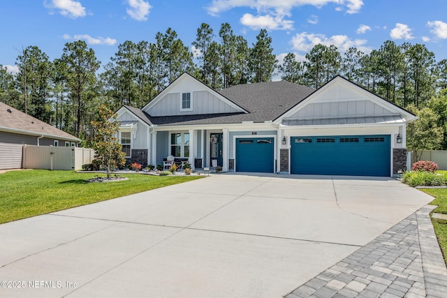 207 Hertford Bridge Way, Saint Johns, FL 32259 - modern inspired farmhouse featuring board and batten siding, a garage, and stone siding