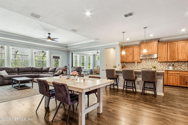 207 Hertford Bridge Way, Saint Johns, FL 32259 - dining room with ceiling fan, ornamental molding, dark wood-style floors, a textured ceiling, and recessed lighting