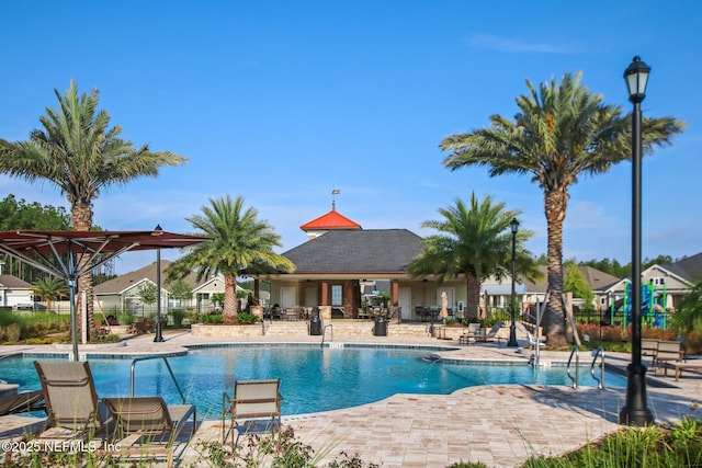 207 Hertford Bridge Way, Saint Johns, FL 32259 - community pool featuring a patio