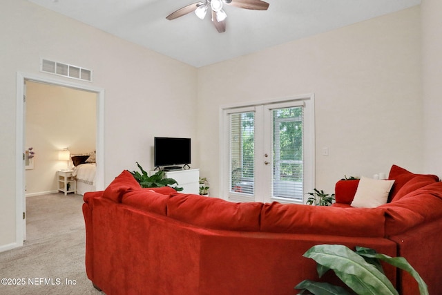 218 Larkin Pl Unit 101, Saint Johns, FL 32259 - living area with light colored carpet, a ceiling fan, and french doors