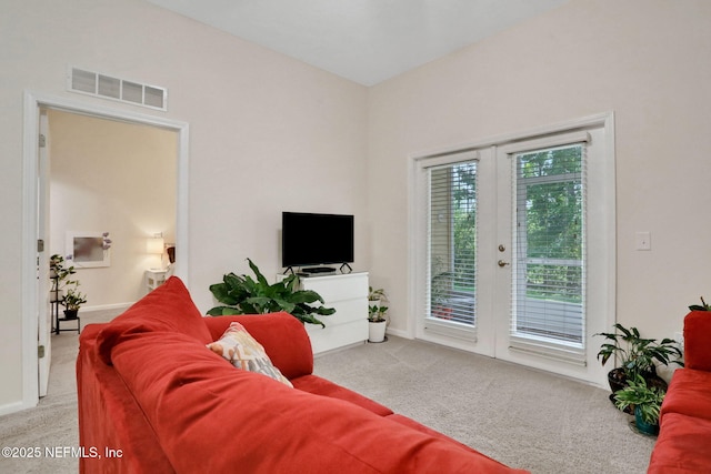 218 Larkin Pl Unit 101, Saint Johns, FL 32259 - carpeted living area featuring french doors
