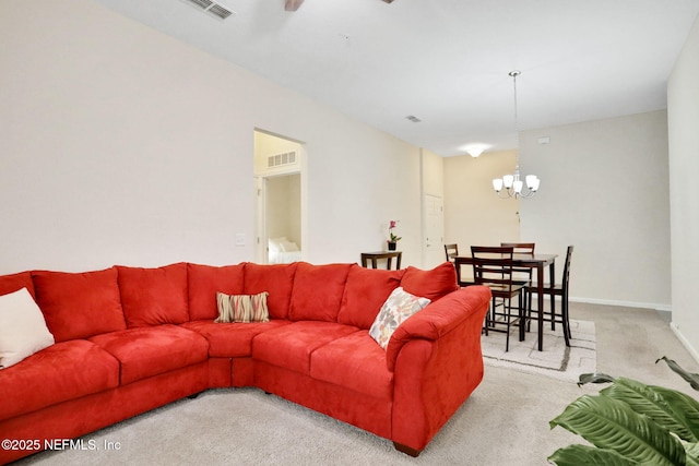 218 Larkin Pl Unit 101, Saint Johns, FL 32259 - living area with light colored carpet, a chandelier, and a ceiling fan