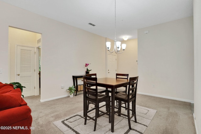 218 Larkin Pl Unit 101, Saint Johns, FL 32259 - dining space featuring light colored carpet and a chandelier