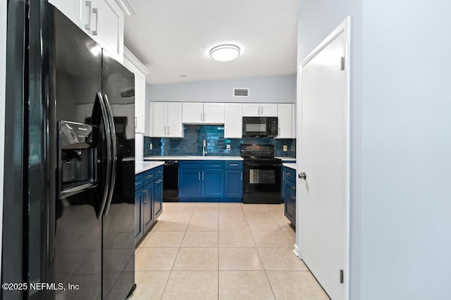 6202 Columbine Dr, Jacksonville, FL 32211 - kitchen with black appliances, blue cabinets, light countertops, tasteful backsplash, and white cabinetry