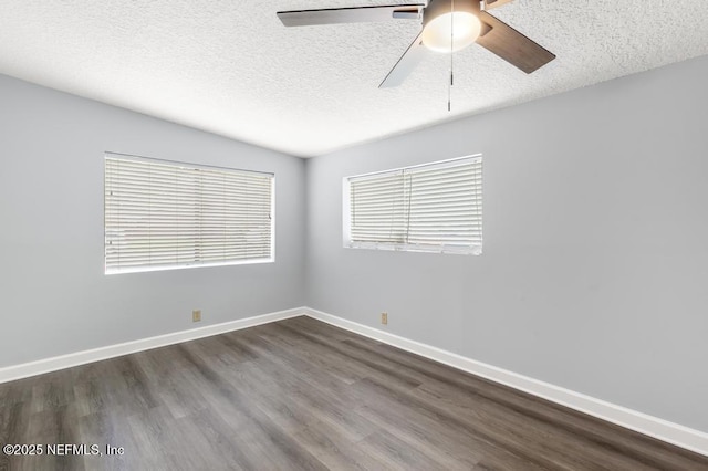 6202 Columbine Dr, Jacksonville, FL 32211 - empty room featuring a textured ceiling, wood finished floors, and ceiling fan