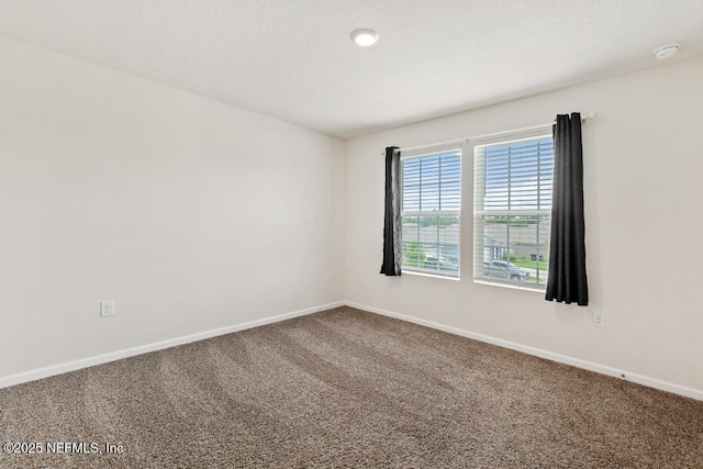 65490 Crested Heron Ct, Yulee, FL 32097 - carpeted empty room featuring baseboards