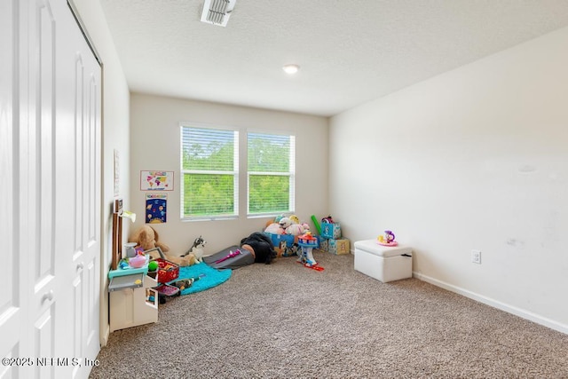 65490 Crested Heron Ct, Yulee, FL 32097 - recreation room with carpet floors and a textured ceiling