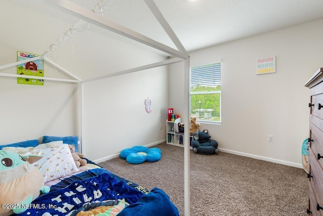 65490 Crested Heron Ct, Yulee, FL 32097 - carpeted bedroom featuring vaulted ceiling and baseboards