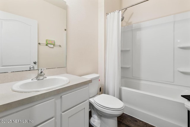65490 Crested Heron Ct, Yulee, FL 32097 - bathroom featuring vanity, shower / bathtub combination with curtain, and wood finished floors