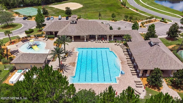 65490 Crested Heron Ct, Yulee, FL 32097 - community pool with a patio area