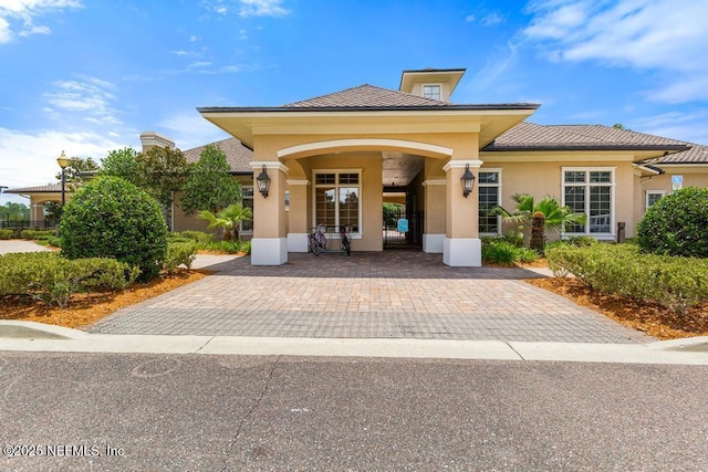 65490 Crested Heron Ct, Yulee, FL 32097 - doorway to property featuring stucco siding