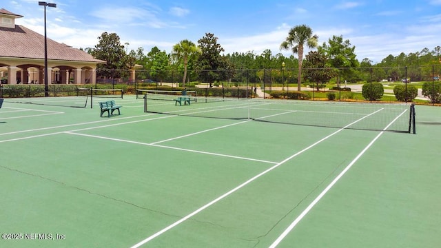 65490 Crested Heron Ct, Yulee, FL 32097 - view of tennis court with community basketball court