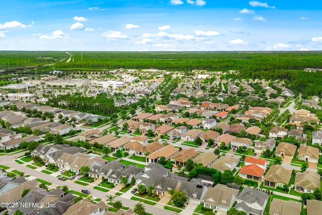 91 Paradise Valley Dr, Ponte Vedra, FL 32081 - aerial overview of property's location with a forest and nearby suburban area