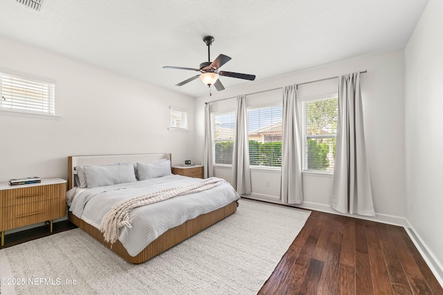 91 Paradise Valley Dr, Ponte Vedra, FL 32081 - bedroom with wood-type flooring, multiple windows, and ceiling fan