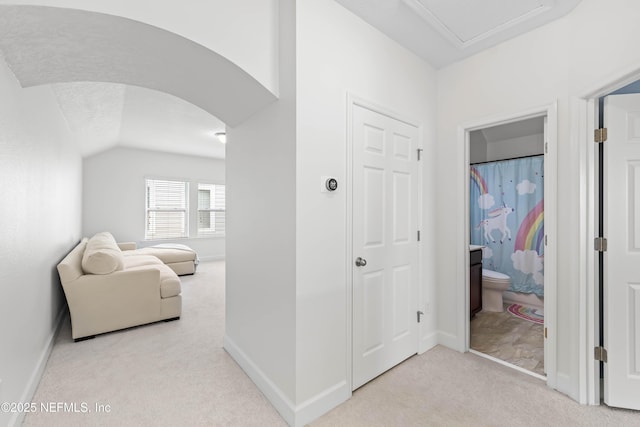 91 Paradise Valley Dr, Ponte Vedra, FL 32081 - hall with carpet flooring, arched walkways, and vaulted ceiling
