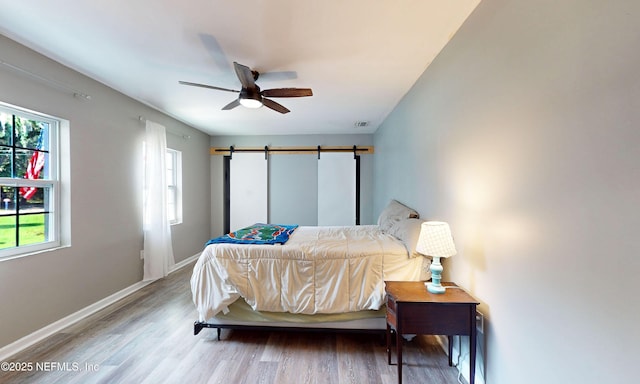 90 SE Forest St, Keystone Heights, FL 32656 - bedroom with wood finished floors and ceiling fan