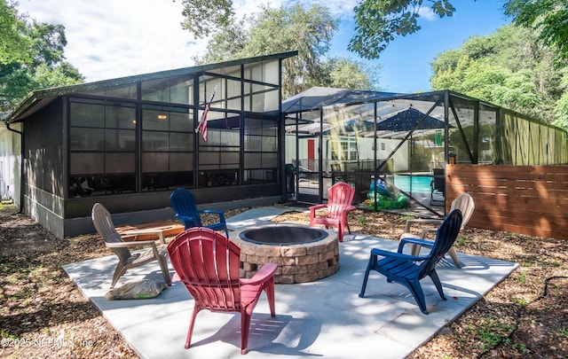 90 SE Forest St, Keystone Heights, FL 32656 - view of patio / terrace featuring a fire pit, glass enclosure, and an outdoor pool