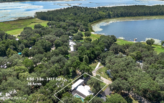 90 SE Forest St, Keystone Heights, FL 32656 - aerial view of property and surrounding area with a large body of water and property boundaries highlighted