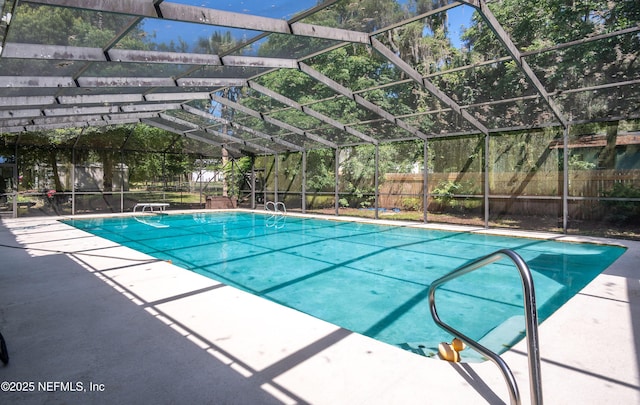 90 SE Forest St, Keystone Heights, FL 32656 - view of swimming pool with a fenced backyard, a patio, and a lanai